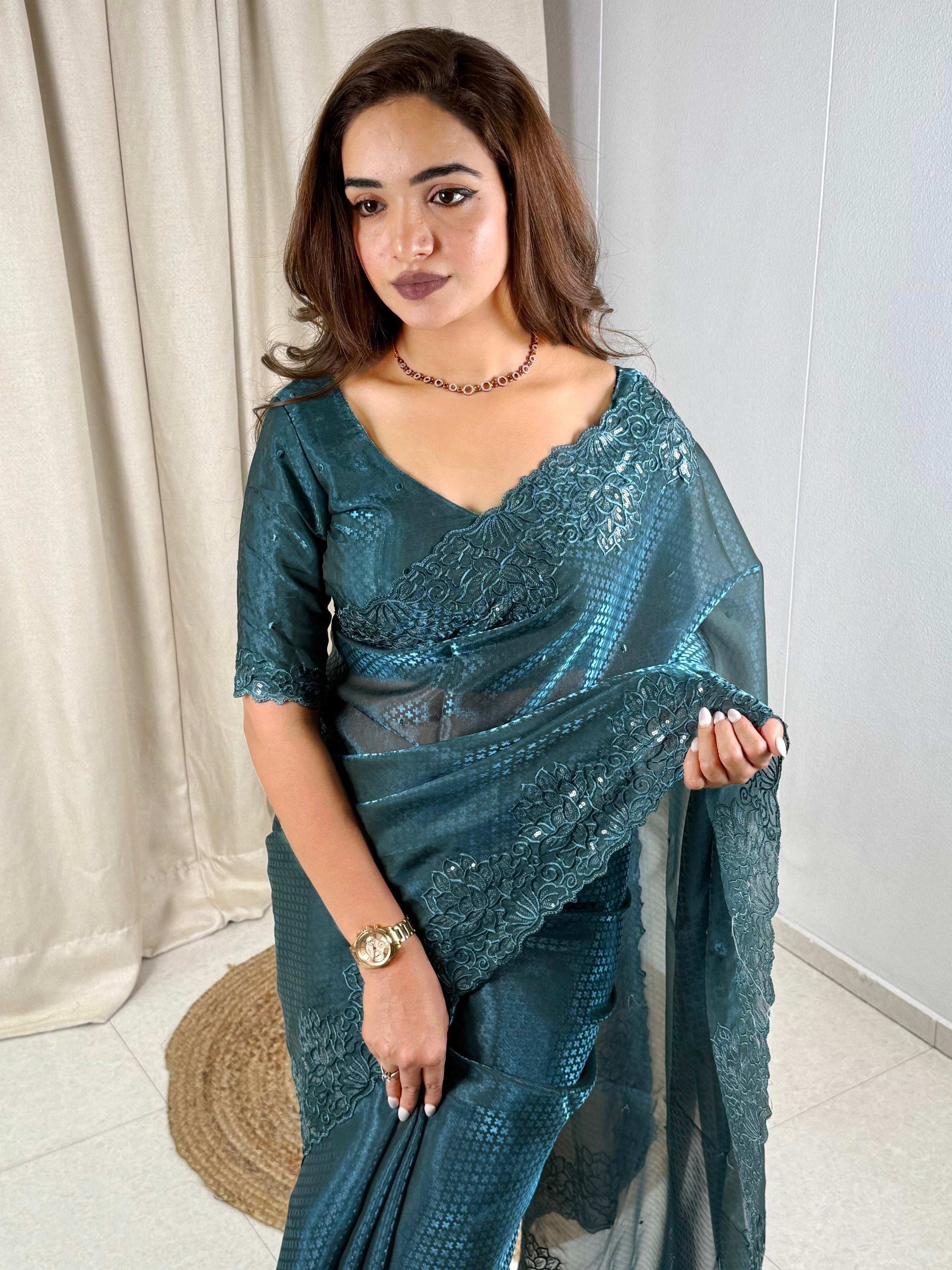 Evanik Teal Glass Satin Jecquard Weaving With Thread Sequence Work Saree With Blouse