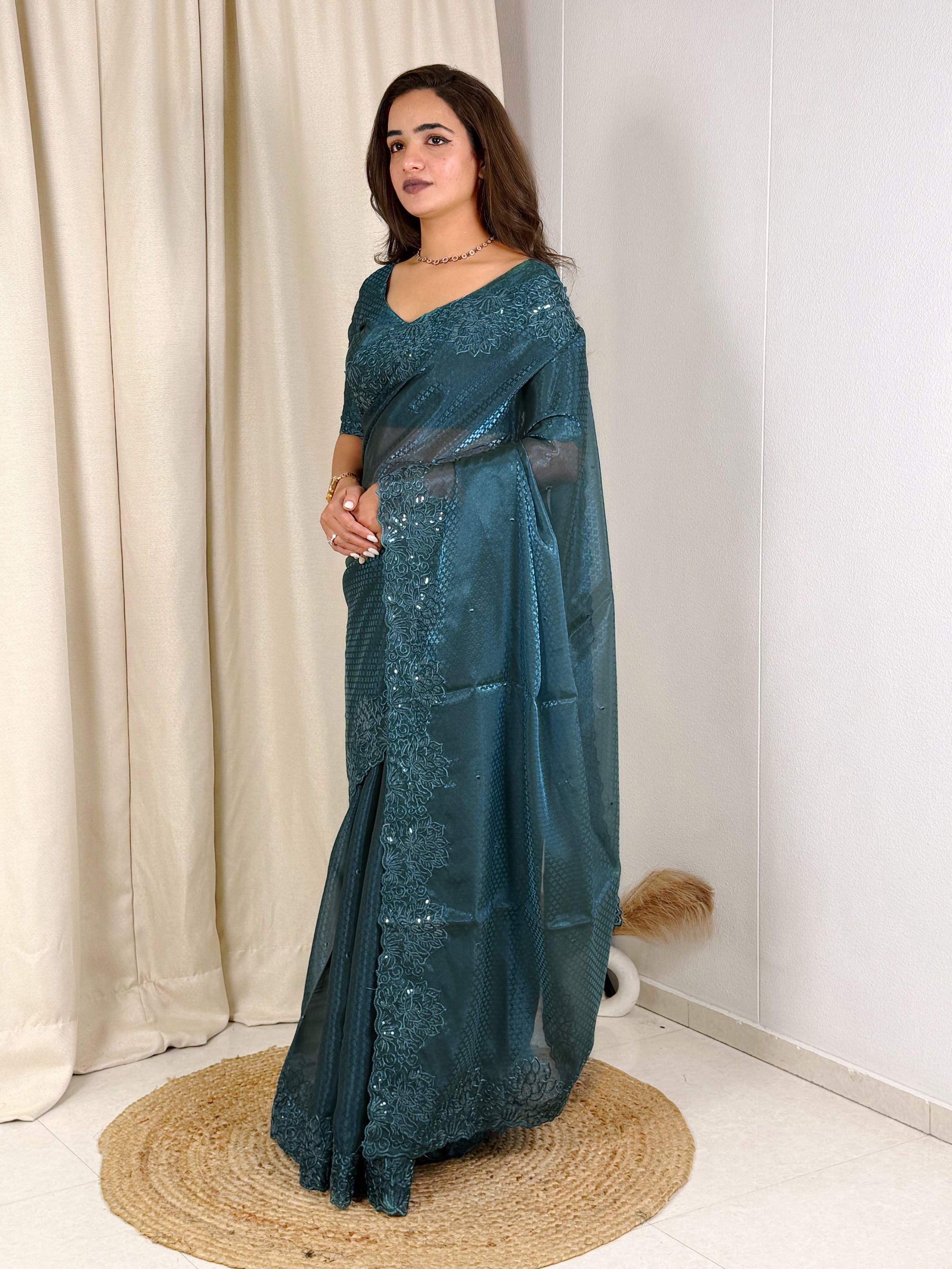 Evanik Teal Glass Satin Jecquard Weaving With Thread Sequence Work Saree With Blouse