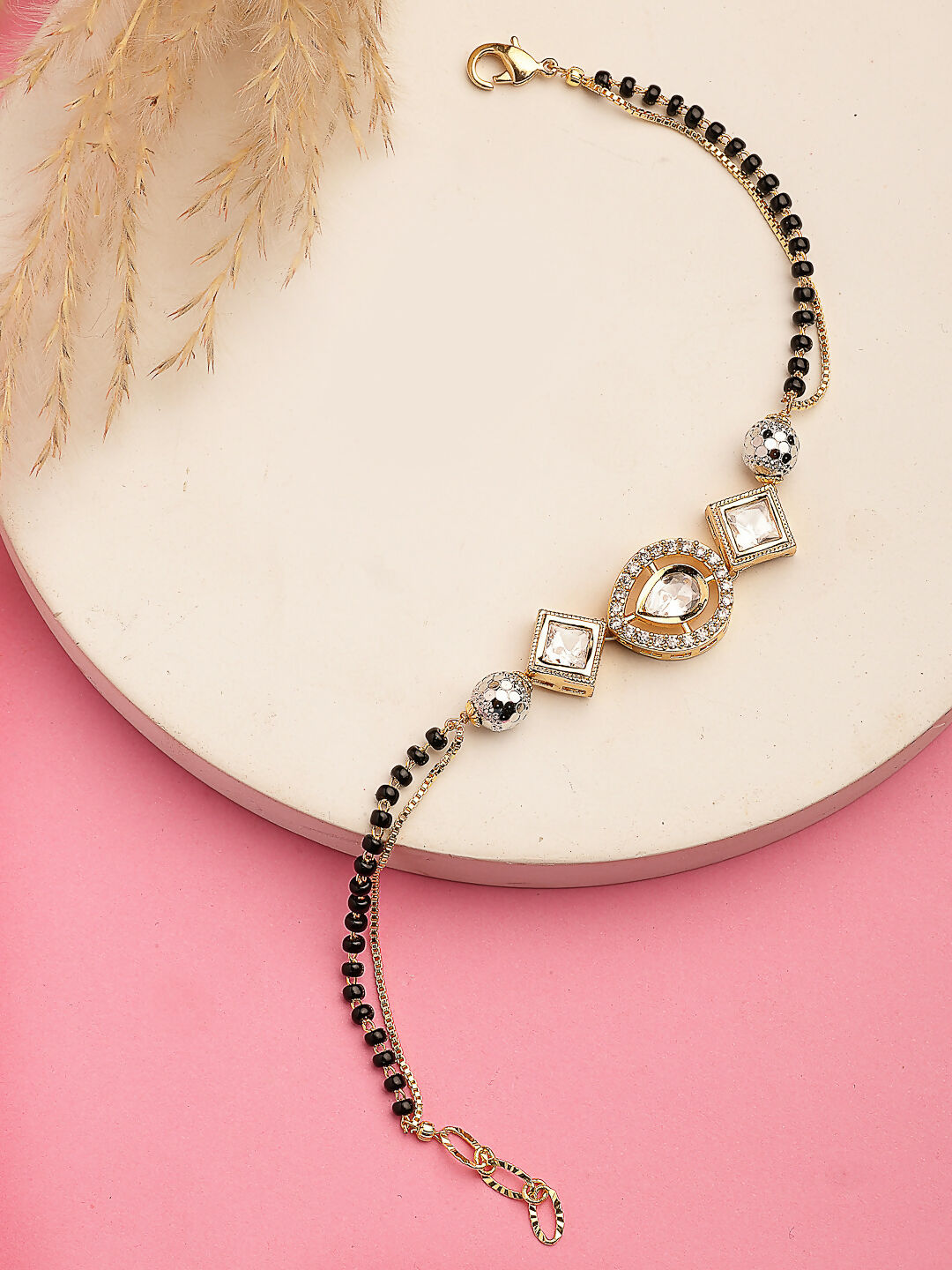 NVR Women Gold-Polished & Black Brass AD-Studded Hand Mangalsutra Link Bracelet