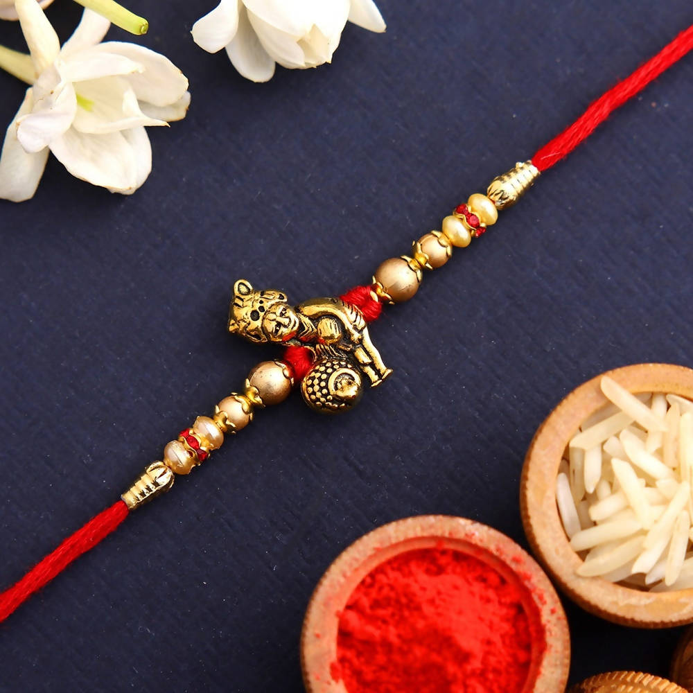 Divine Lord Krishna Pearl Rakhi & Cashew Jar